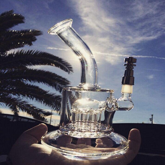 concentrate bong rig in hand